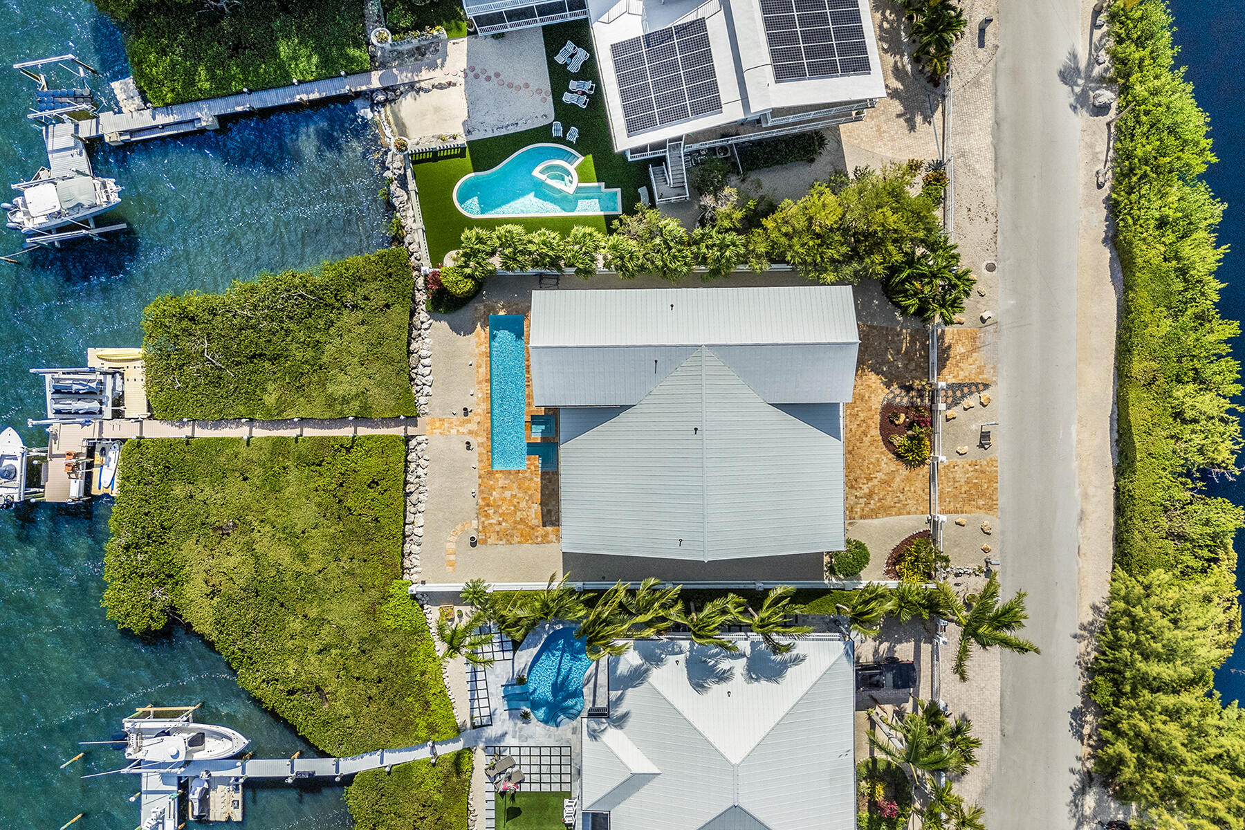 21 Mutiny Place Key Largo, FL 33037 - Photo 14 of 57 an aerial view of a house with a yard and a fountain