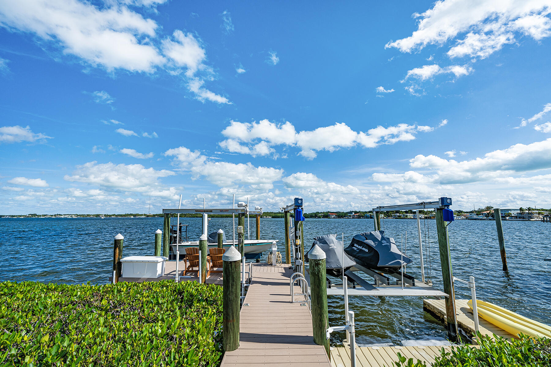 21 Mutiny Place Key Largo, FL 33037 - Photo 27 of 57 a view of a balcony with chairs and potted plants
