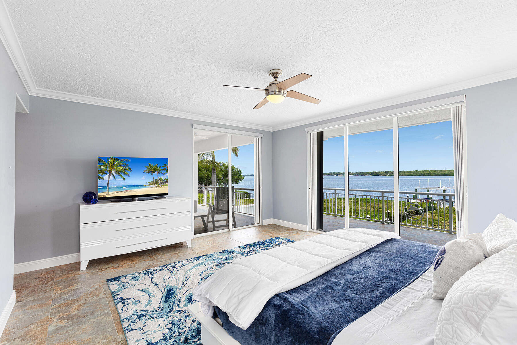 21 Mutiny Place Key Largo, FL 33037 - Photo 40 of 57 a bedroom with a bed and a large window