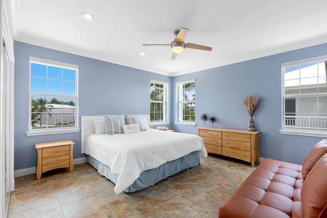 a view of a swimming pool with an outdoor seating