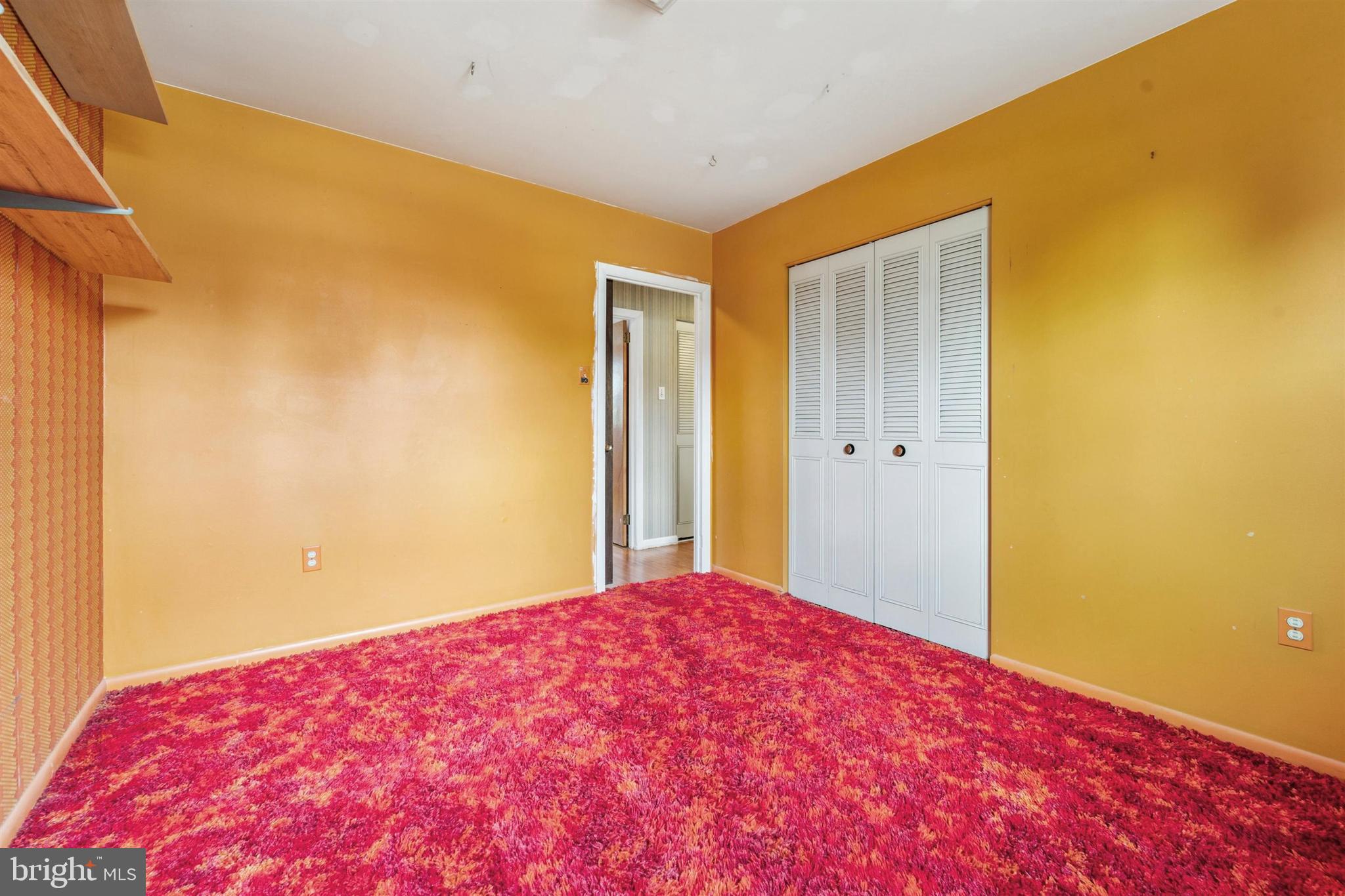 1220 Sylvan Road West Chester, PA 19382 - Photo 27 of 33 a bedroom with a bed and a mirror