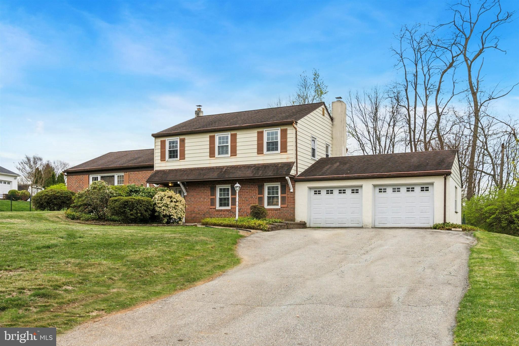 1220 Sylvan Road West Chester, PA 19382 - Photo 33 of 33 a front view of a house with a garden