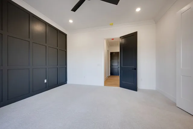 a bathroom with a shower and a toilet