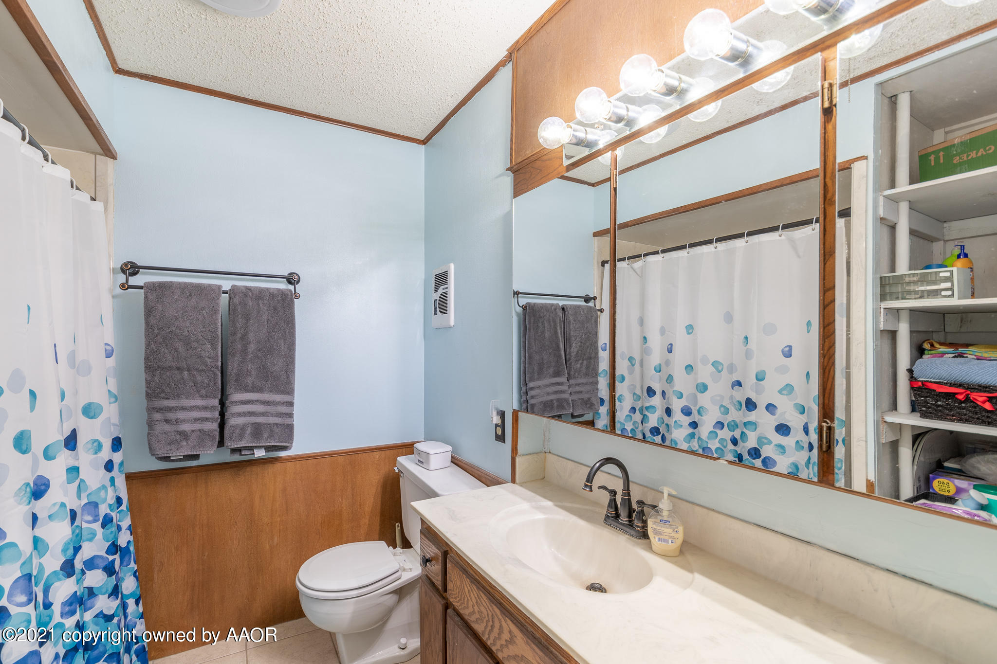 4904 Bowie Street Amarillo, TX 79110 - Photo 17 of 27 hallway bathroom