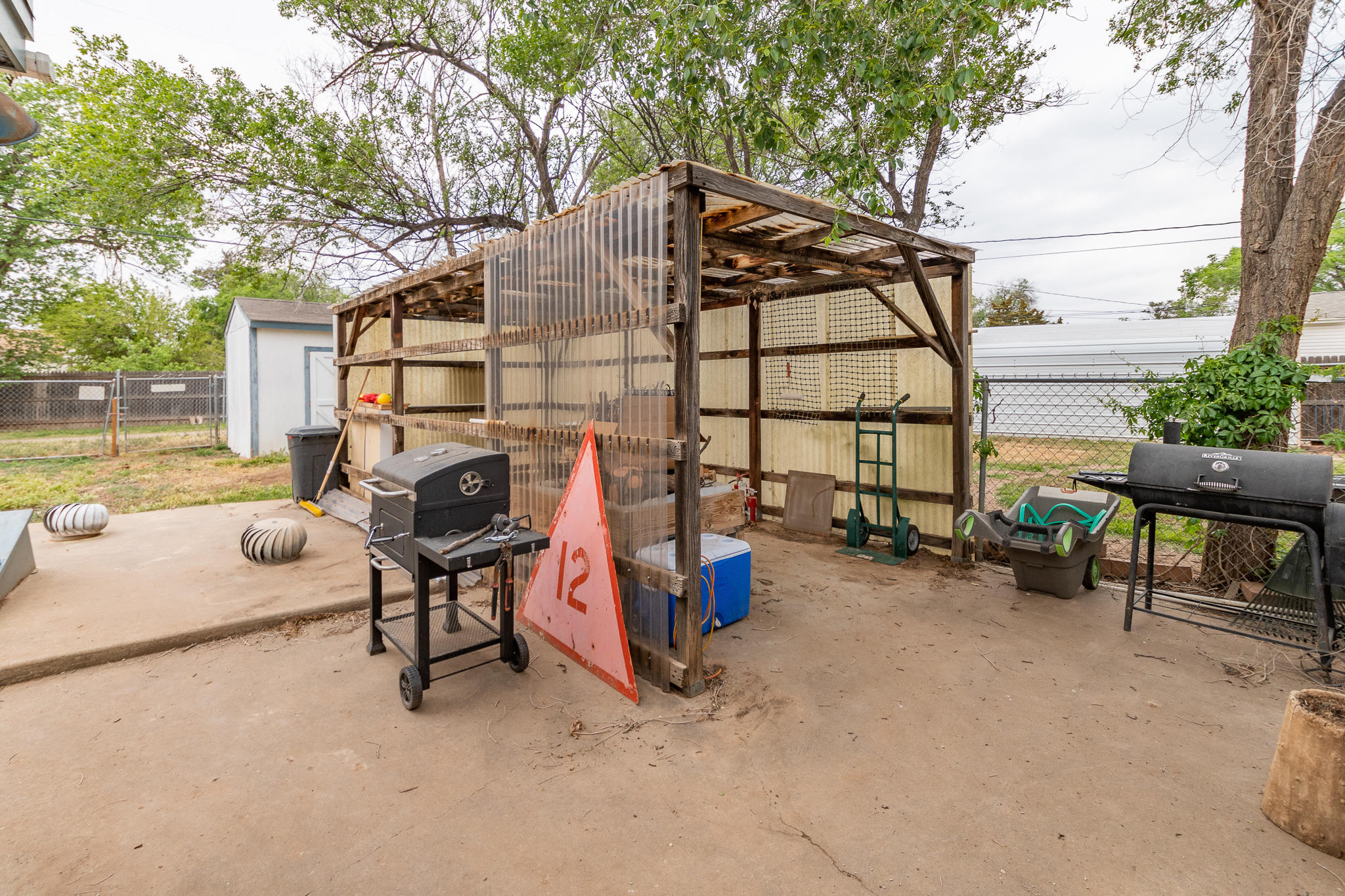 4904 Bowie Street Amarillo, TX 79110 - Photo 24 of 27 backyard carport
