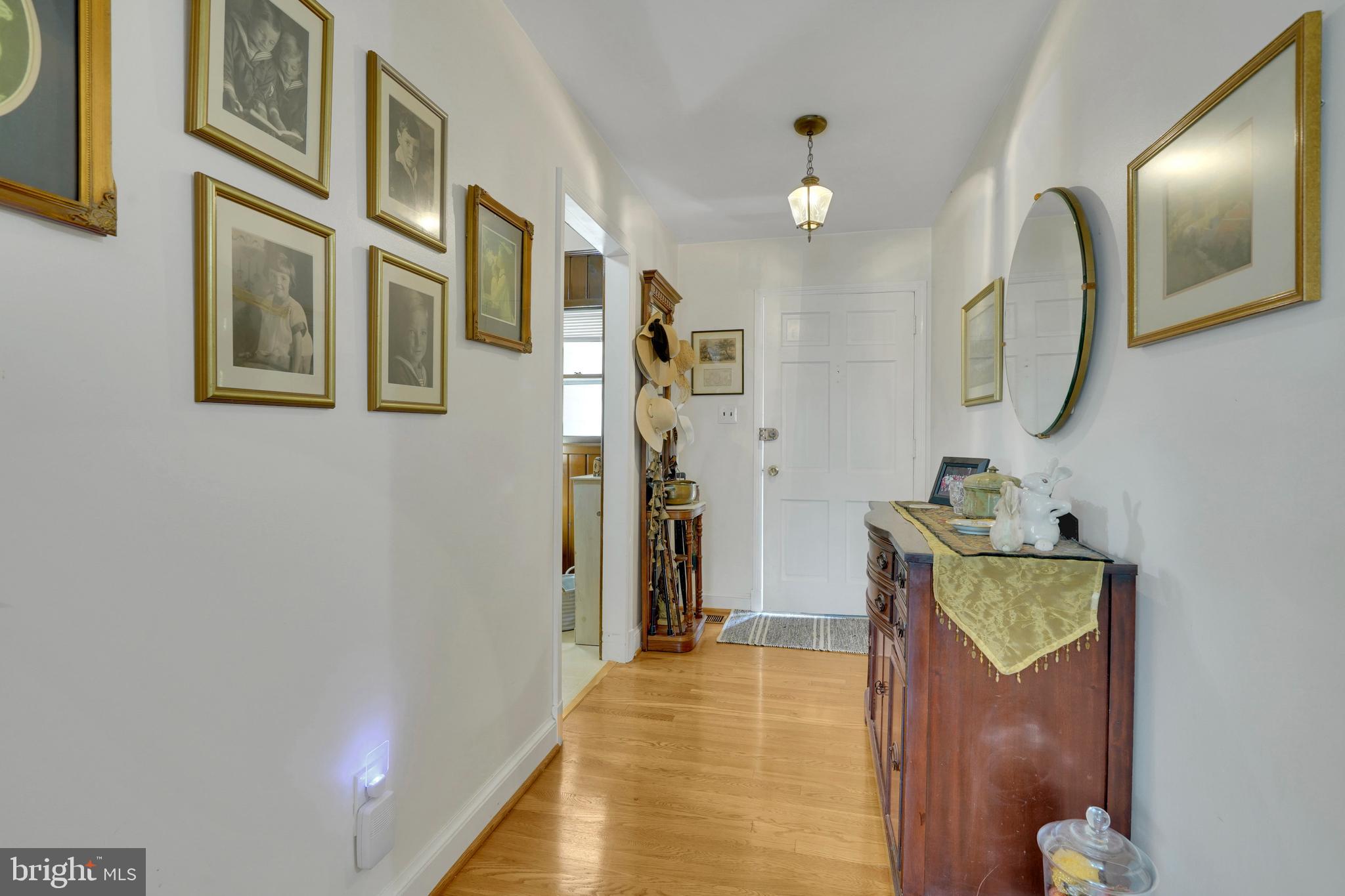 7614 Range Road Alexandria, VA 22306 - Photo 2 of 37 a view of an entryway with wooden floor