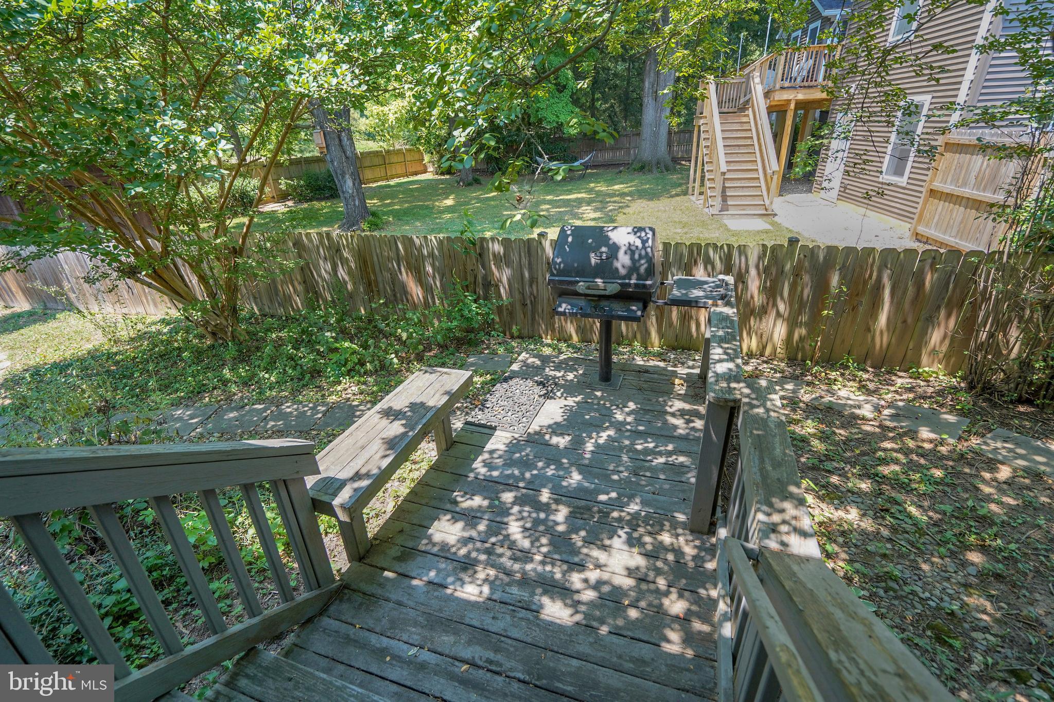 7614 Range Road Alexandria, VA 22306 - Photo 26 of 37 a view of balcony with wooden floor and outdoor seating