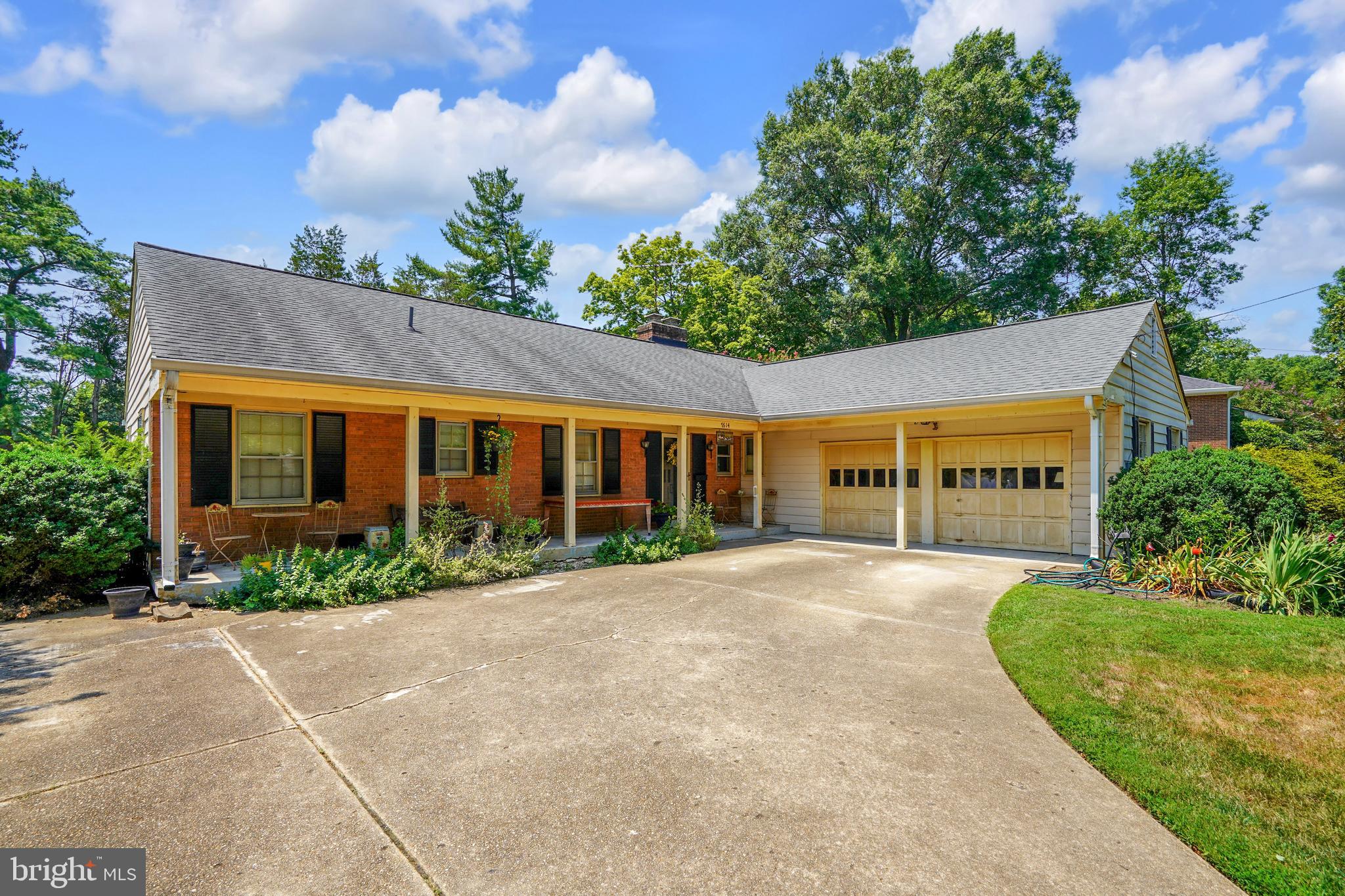7614 Range Road Alexandria, VA 22306 - Photo 31 of 37 front view of a house with a yard