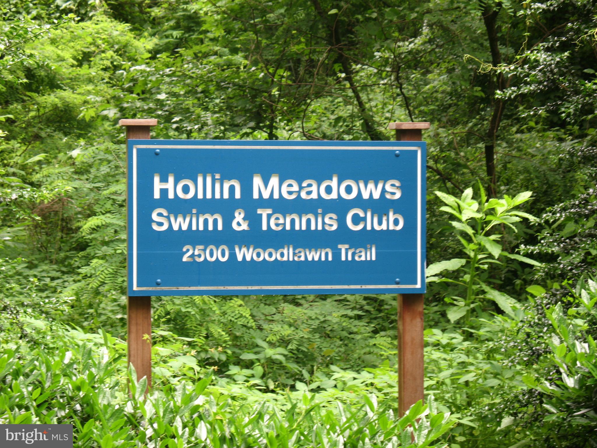 7614 Range Road Alexandria, VA 22306 - Photo 33 of 37 a sign broad in front of red brick house