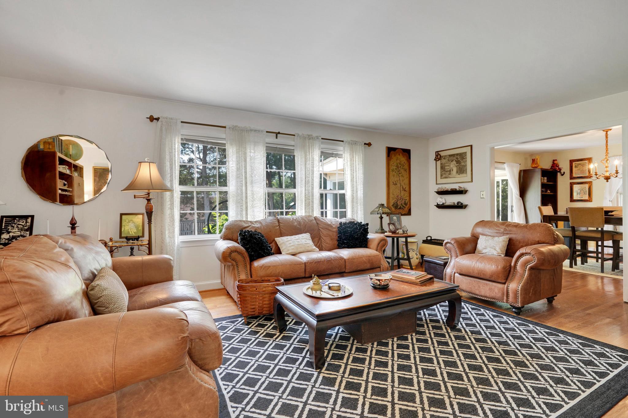 7614 Range Road Alexandria, VA 22306 - Photo 4 of 37 a living room with furniture a rug and a large window