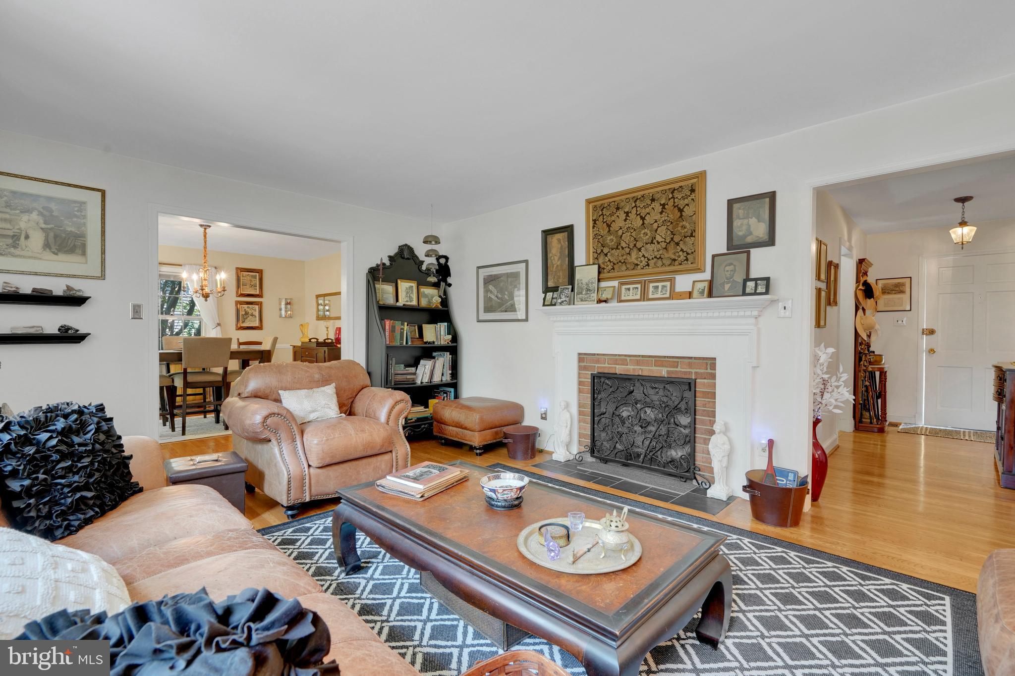 7614 Range Road Alexandria, VA 22306 - Photo 5 of 37 a living room with furniture and a fireplace