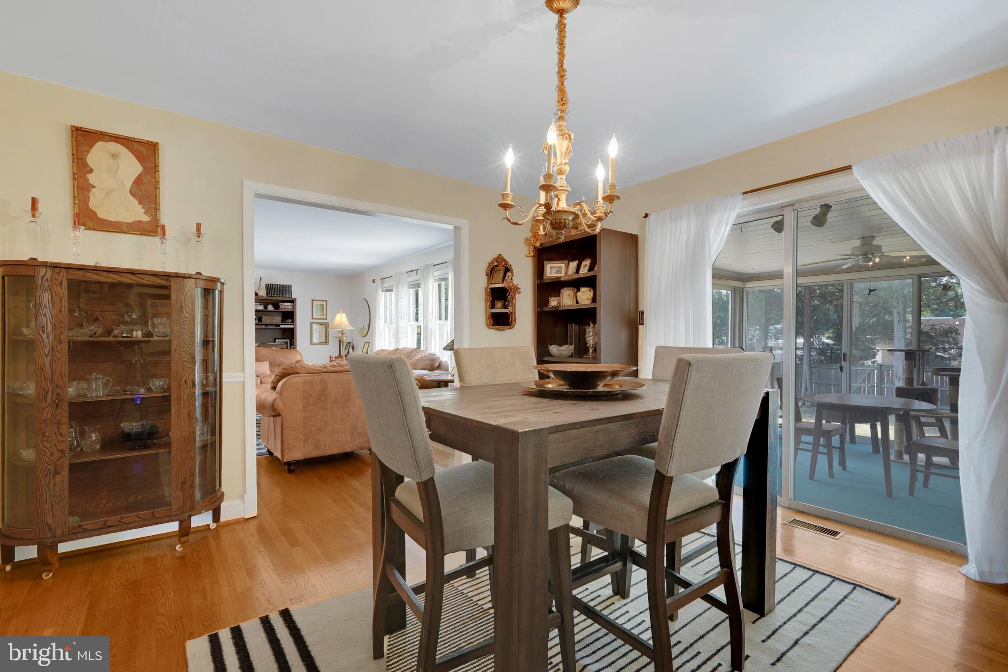 7614 Range Road Alexandria, VA 22306 - Photo 7 of 37 a view of a dining room with furniture window and wooden floor