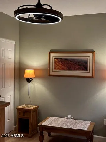 a living room with a lamp