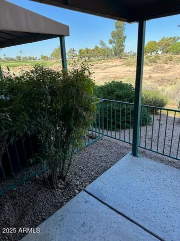 a view of balcony with furniture