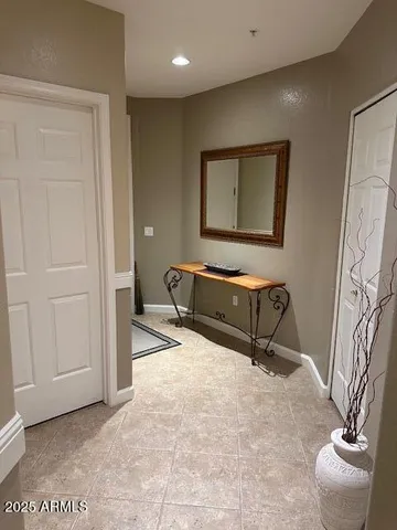 a building with a couch and a potted plant