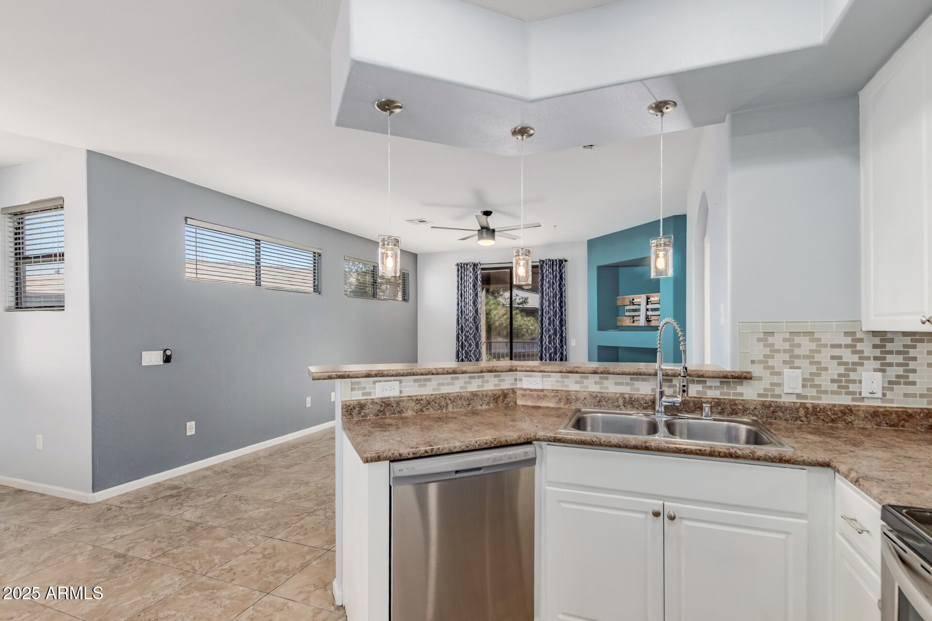 705 West Queen Creek Road, Unit 2146 Chandler, AZ 85248 - Photo 15 of 44 a bathroom with a granite countertop sink and a mirror