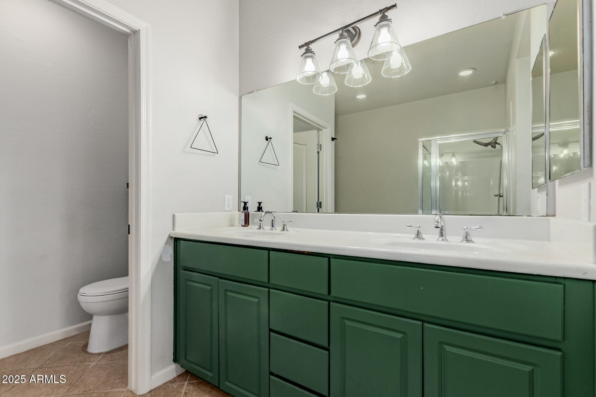 705 West Queen Creek Road, Unit 2146 Chandler, AZ 85248 - Photo 19 of 44 a bathroom with a double vanity sink mirror and toilet