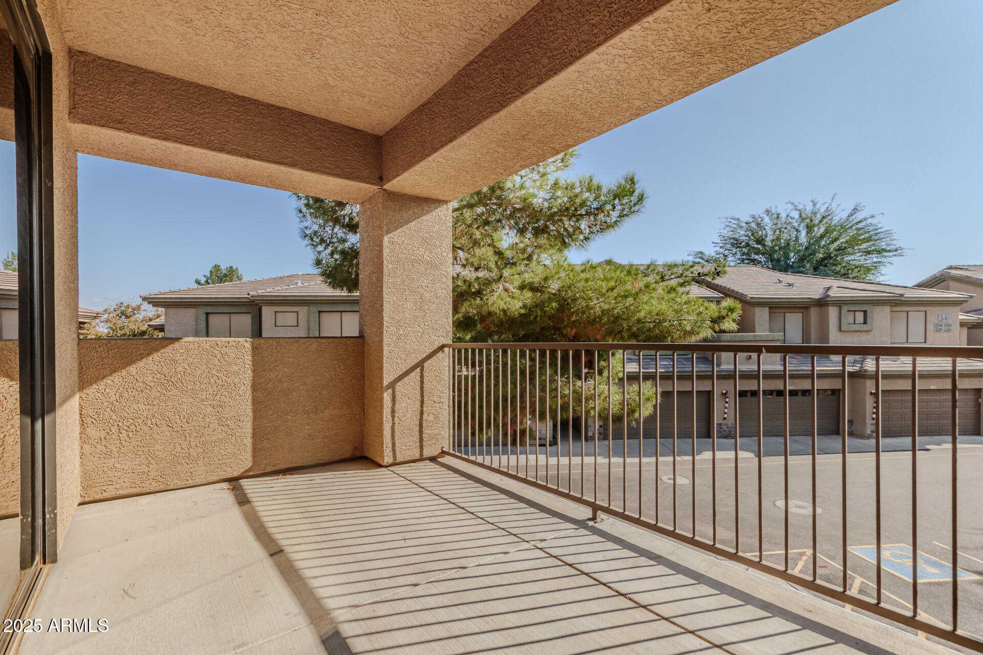 705 West Queen Creek Road, Unit 2146 Chandler, AZ 85248 - Photo 28 of 44 a view of a balcony with potted plants
