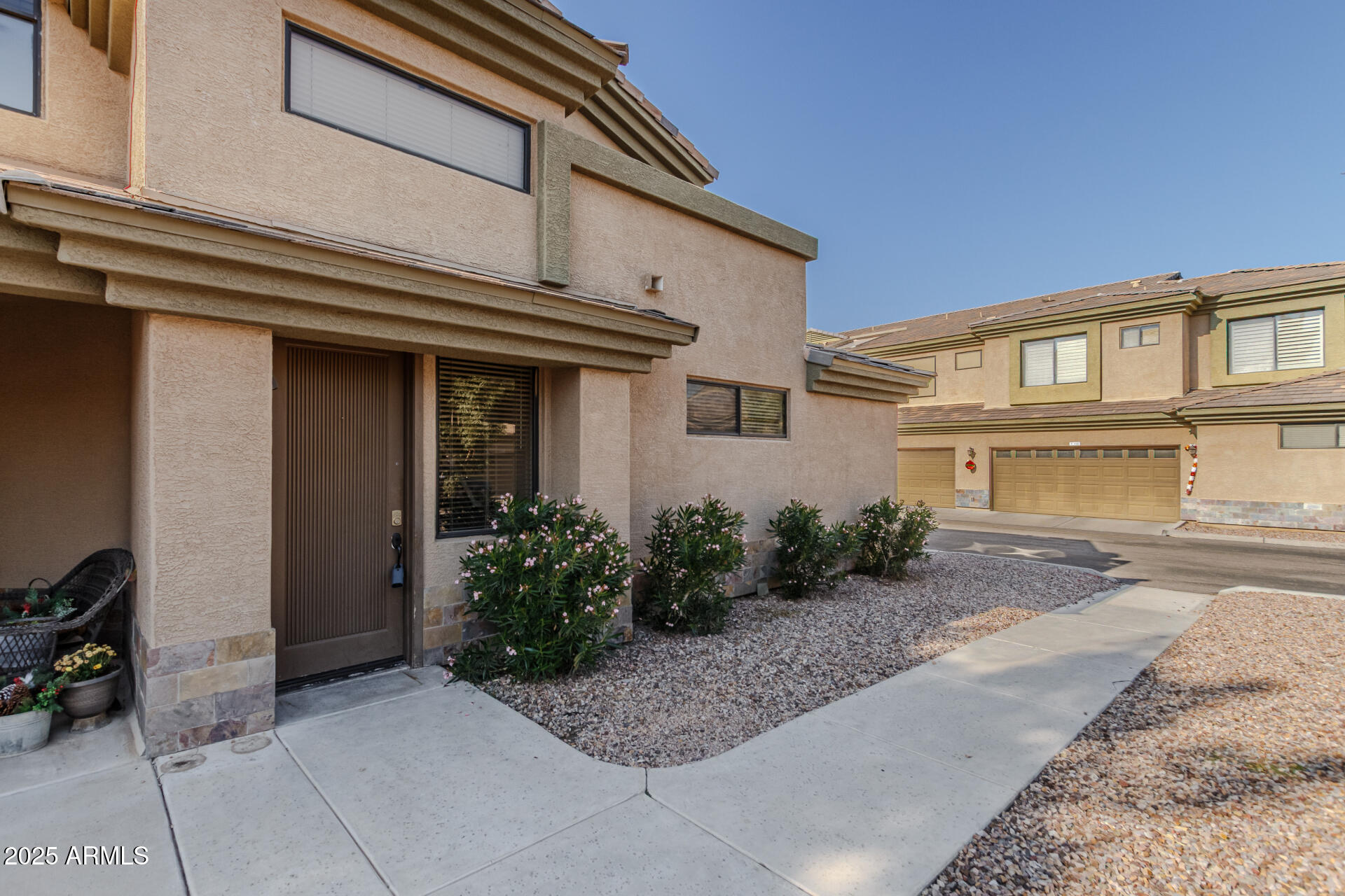705 West Queen Creek Road, Unit 2146 Chandler, AZ 85248 - Photo 3 of 44 a front view of a house