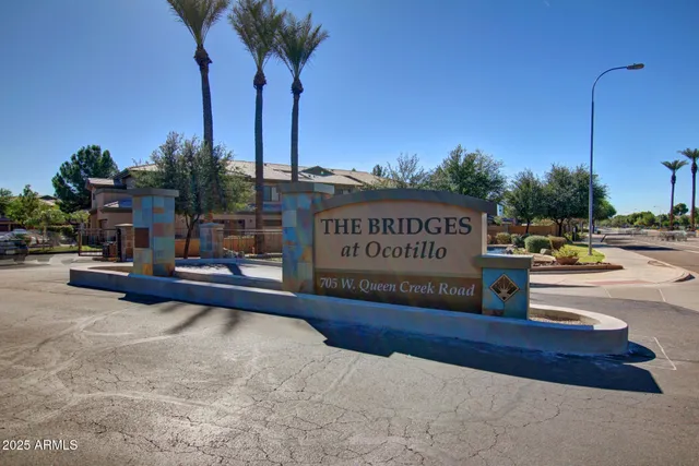 a view of outdoor space with signage and flags