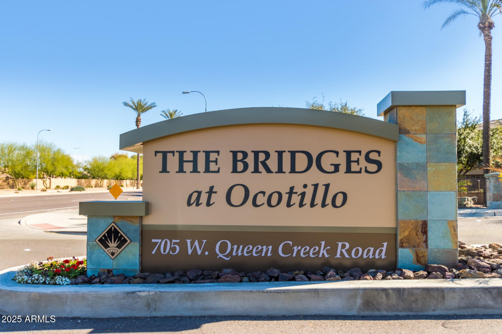 705 West Queen Creek Road, Unit 2146 Chandler, AZ 85248 - Photo 38 of 44 a view of outdoor space with signage and flags