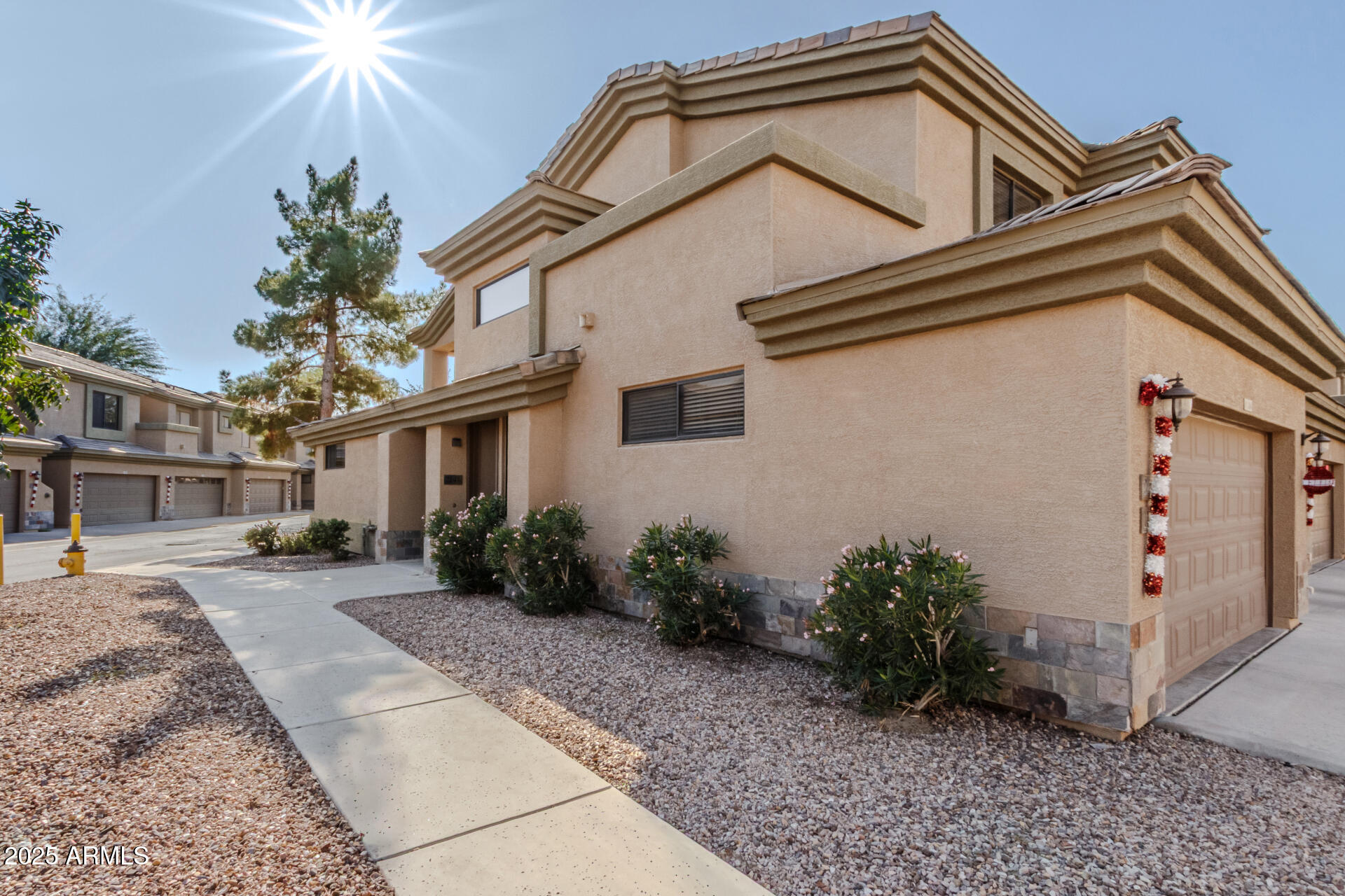 705 West Queen Creek Road, Unit 2146 Chandler, AZ 85248 - Photo 4 of 44 a view of a house with a yard