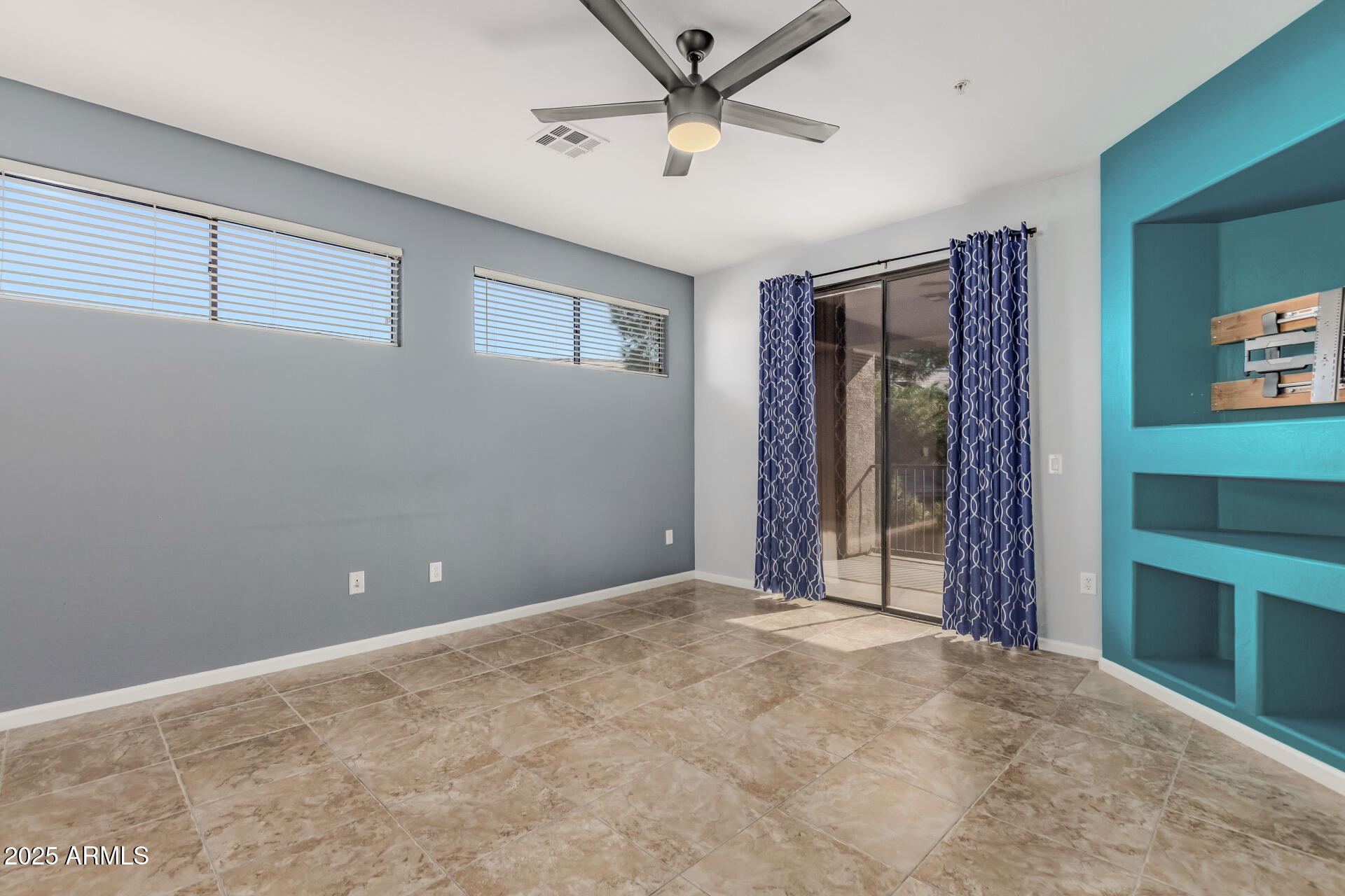 705 West Queen Creek Road, Unit 2146 Chandler, AZ 85248 - Photo 9 of 44 a view of a livingroom with a ceiling fan and window