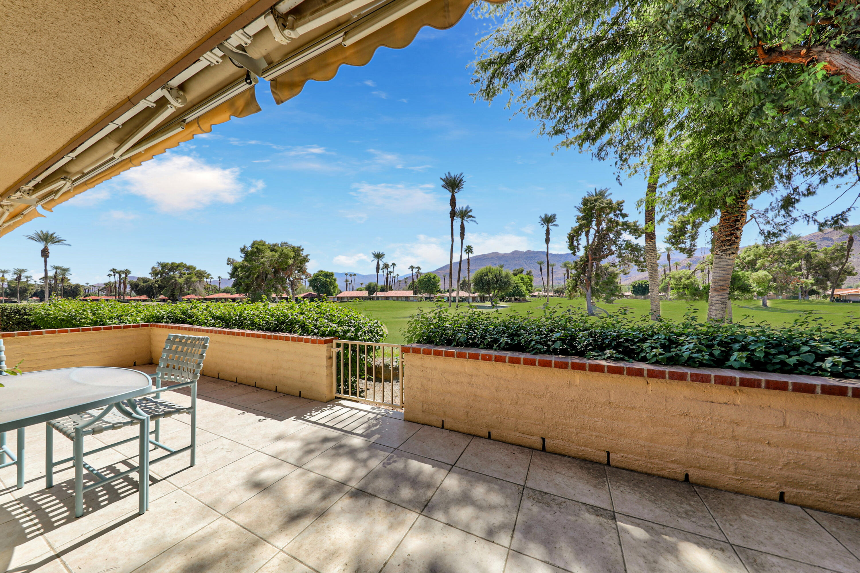 27 Seville Drive Rancho Mirage, CA 92270 - Photo 22 of 50 a view of a terrace with couches and sky view