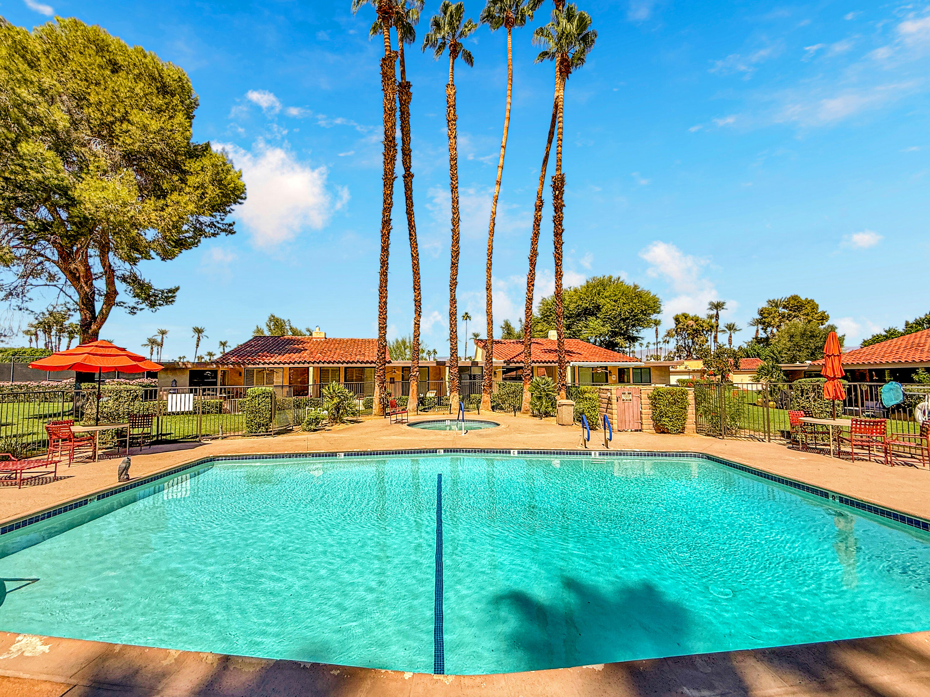 27 Seville Drive Rancho Mirage, CA 92270 - Photo 29 of 50 a view of a house with a yard and sitting area
