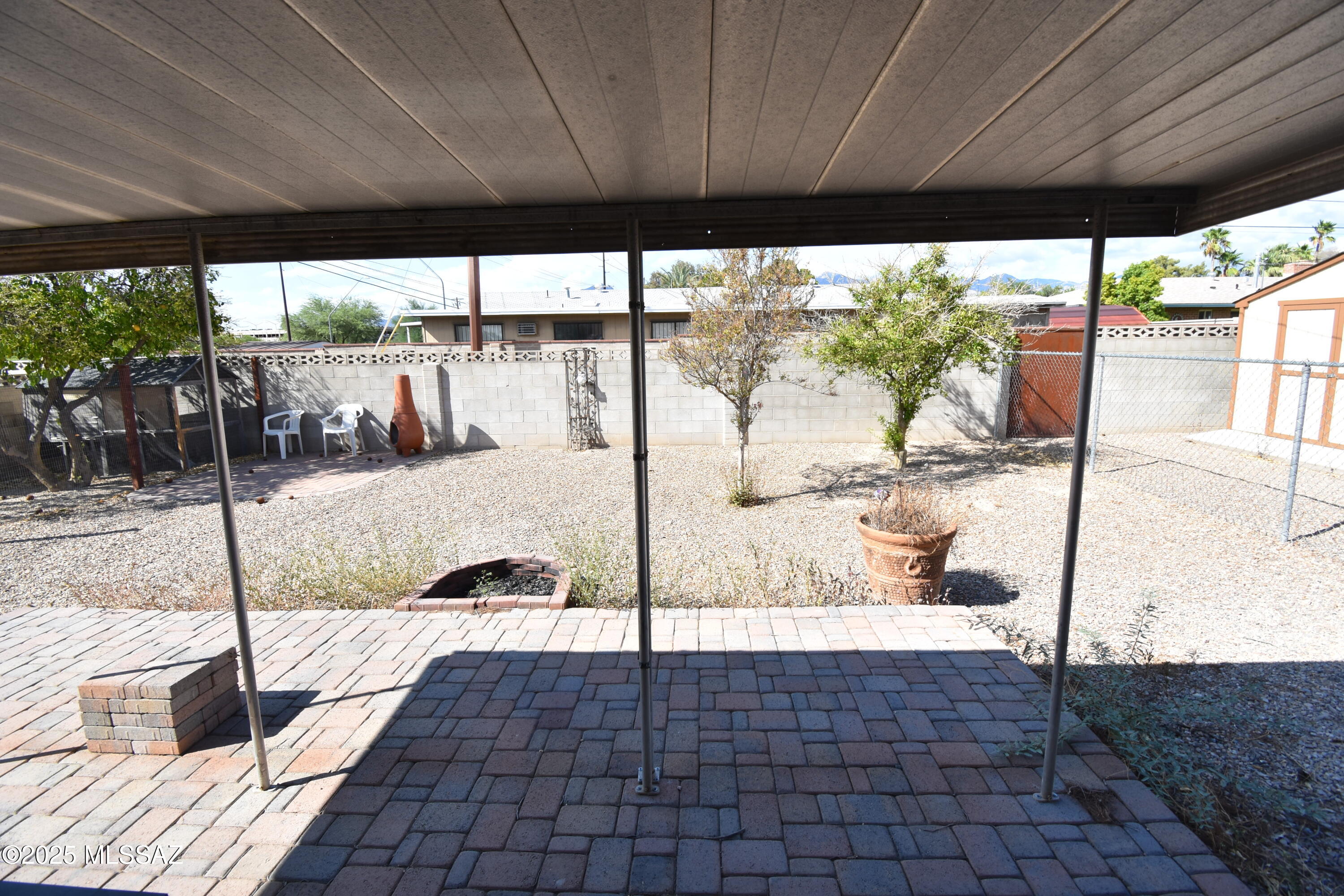 5501 East Spring Street Tucson, AZ 85712 - Photo 7 of 32 a view of a swimming pool with a porch