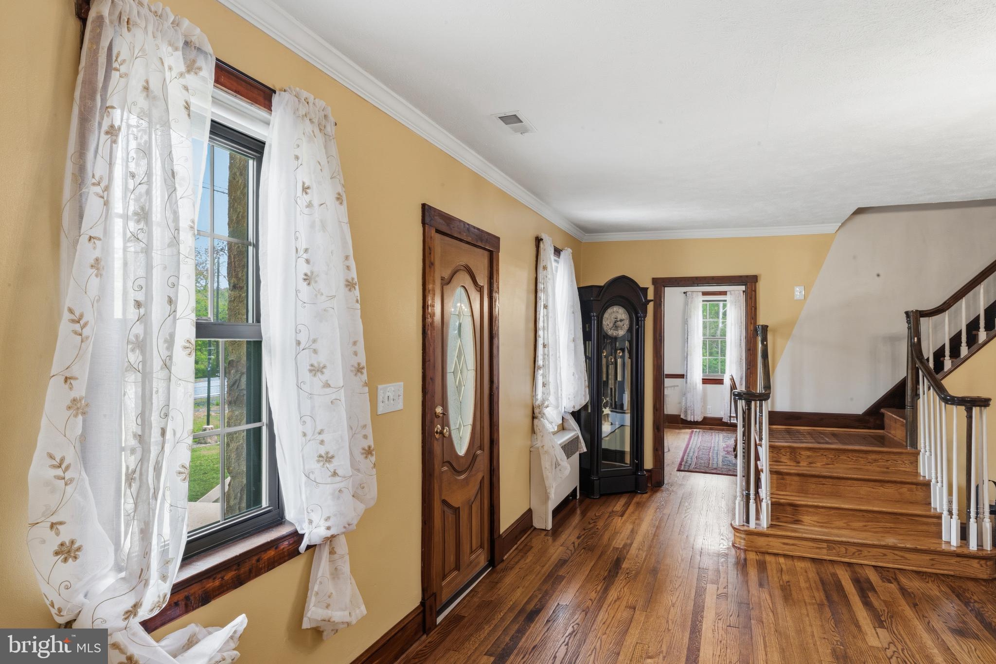 3593 Strasburg Road Strasburg, VA 22657 - Photo 13 of 113 a view of a hallway with wooden floor and staircase
