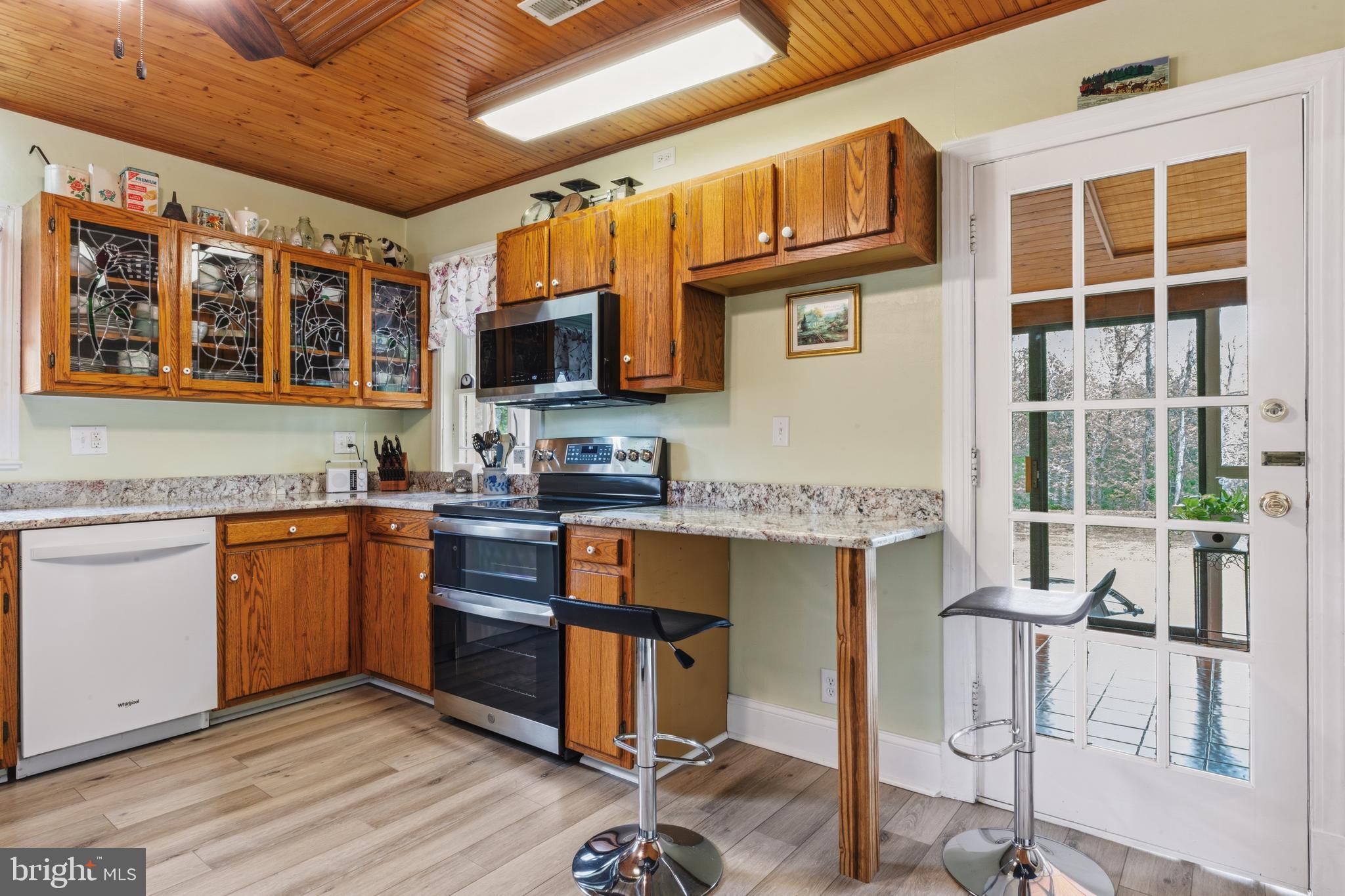 3593 Strasburg Road Strasburg, VA 22657 - Photo 17 of 113 a kitchen with stainless steel appliances granite countertop a stove and cabinets