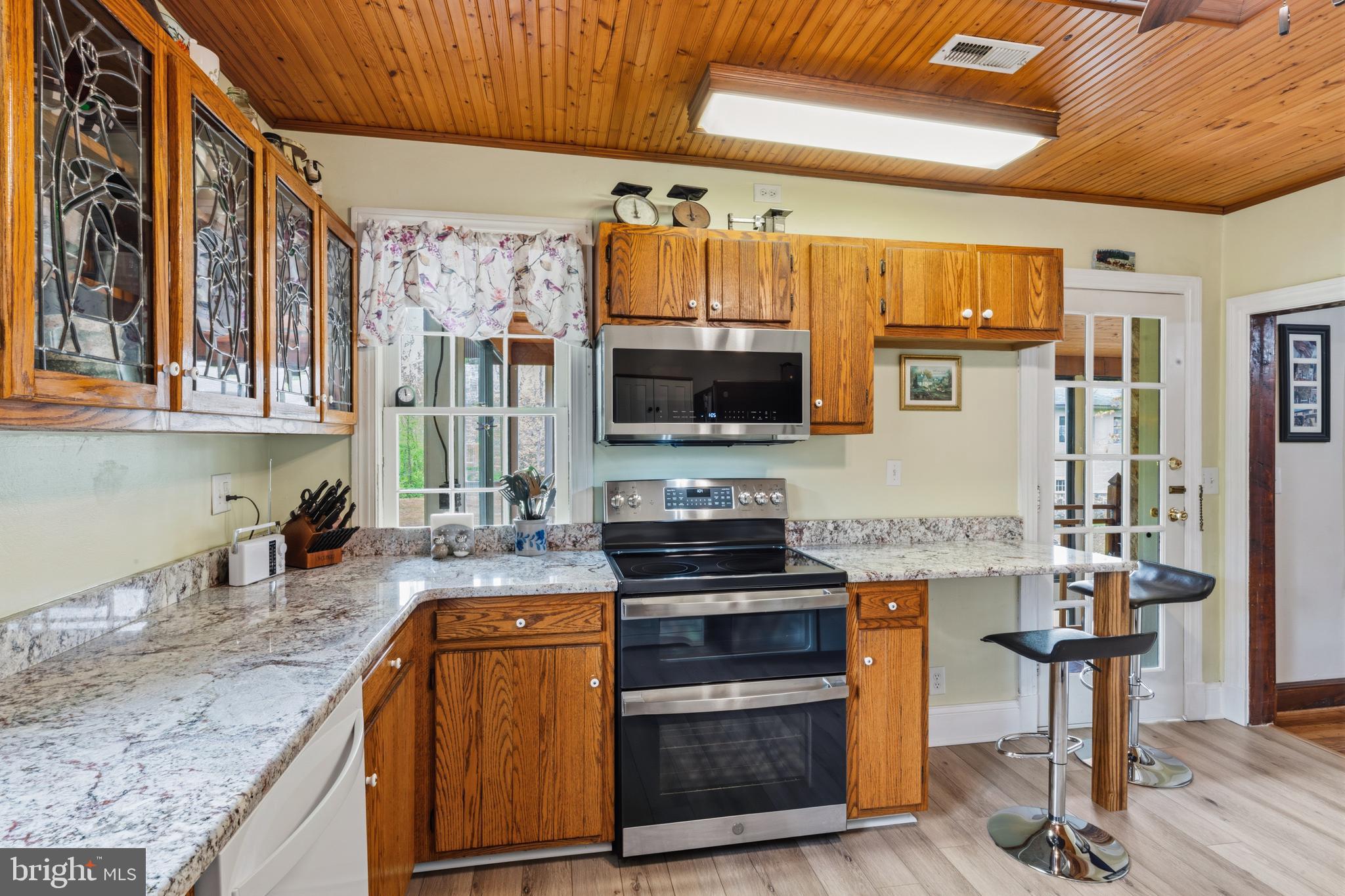 3593 Strasburg Road Strasburg, VA 22657 - Photo 18 of 113 a kitchen with stainless steel appliances granite countertop a stove and a sink