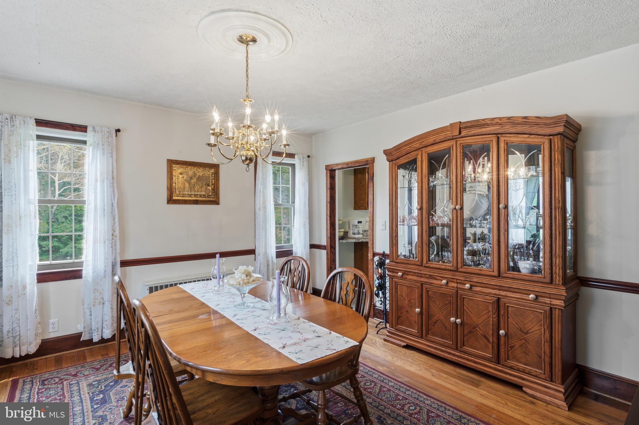 3593 Strasburg Road Strasburg, VA 22657 - Photo 25 of 113 a view of a dining room with furniture window and wooden floor