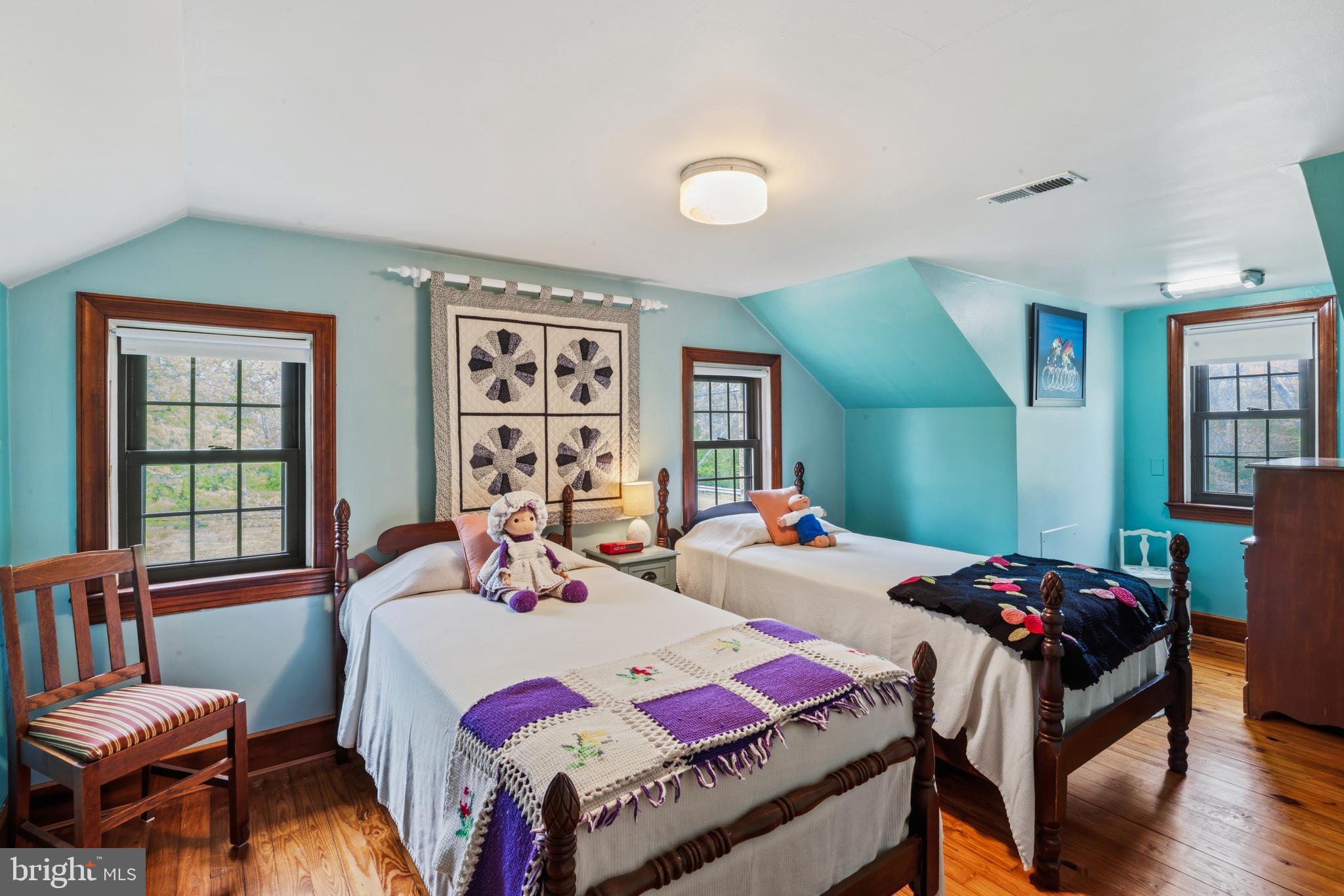 3593 Strasburg Road Strasburg, VA 22657 - Photo 42 of 113 a bedroom with a bed and wooden floor