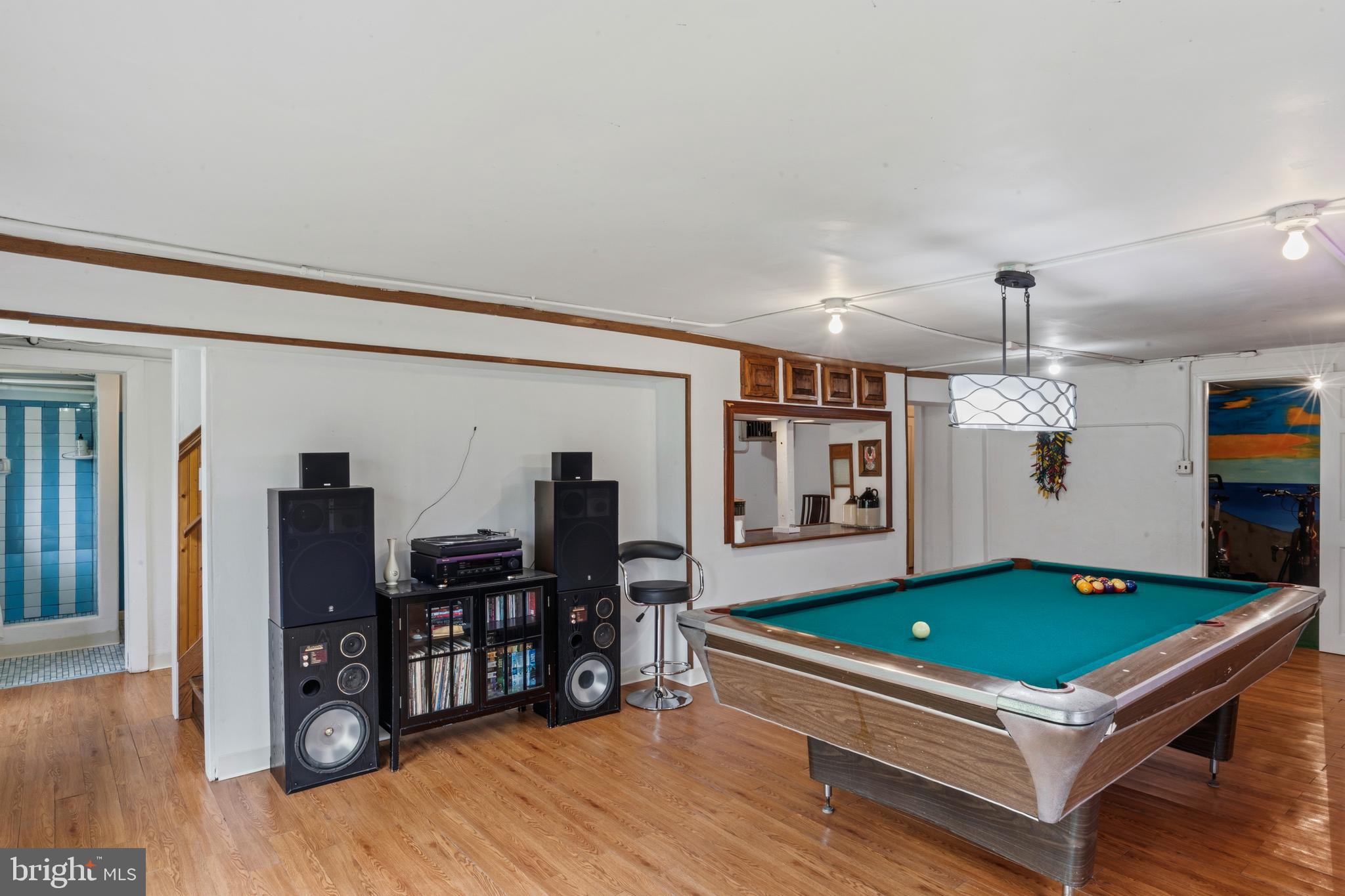 3593 Strasburg Road Strasburg, VA 22657 - Photo 54 of 113 a room with pool table and wooden floor