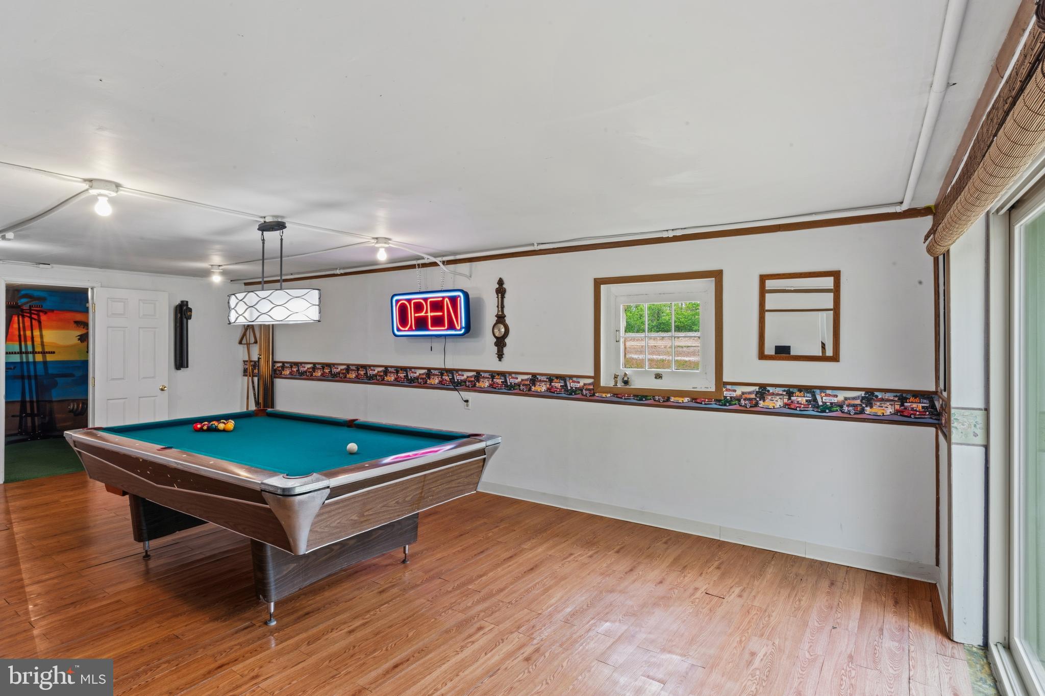 3593 Strasburg Road Strasburg, VA 22657 - Photo 55 of 113 a room with pool table and wooden floor