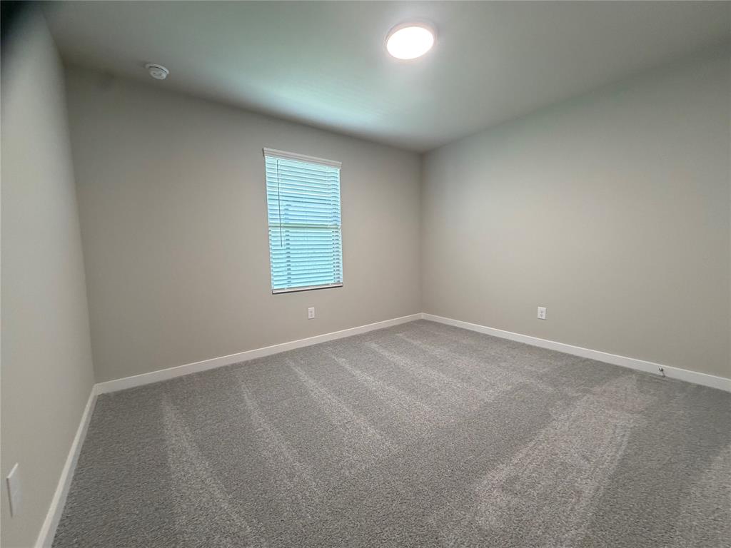 517 River Rdg Drive McKinney, TX 75071 - Photo 13 of 14 an empty room with a window