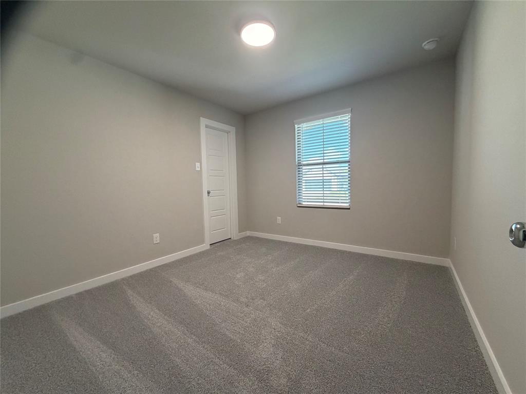 517 River Rdg Drive McKinney, TX 75071 - Photo 10 of 14 an empty room with windows