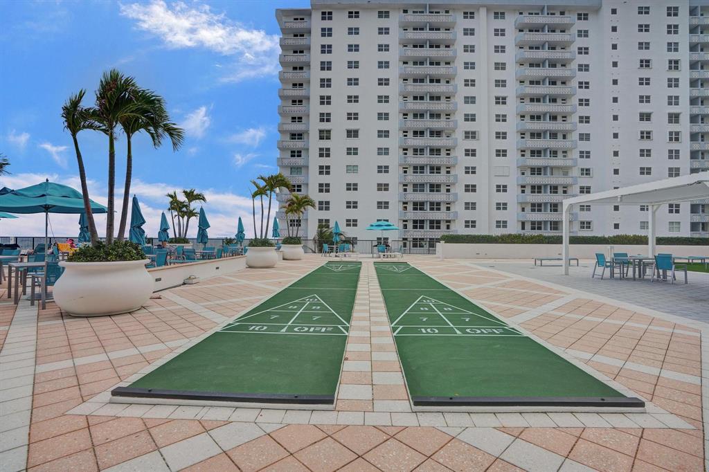 4280 Galt Ocean Drive, Unit 10A Fort Lauderdale, FL 33308 - Photo 30 of 36 a view of a swimming pool and lounge chair