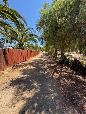 a view of a backyard of a house