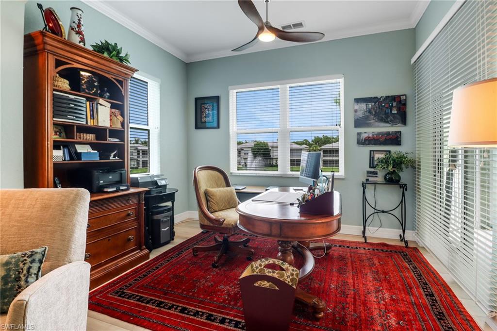 3530 Lansing Loop, Unit 204 Estero, FL 33928 - Photo 19 of 48 a living room with furniture and a rug