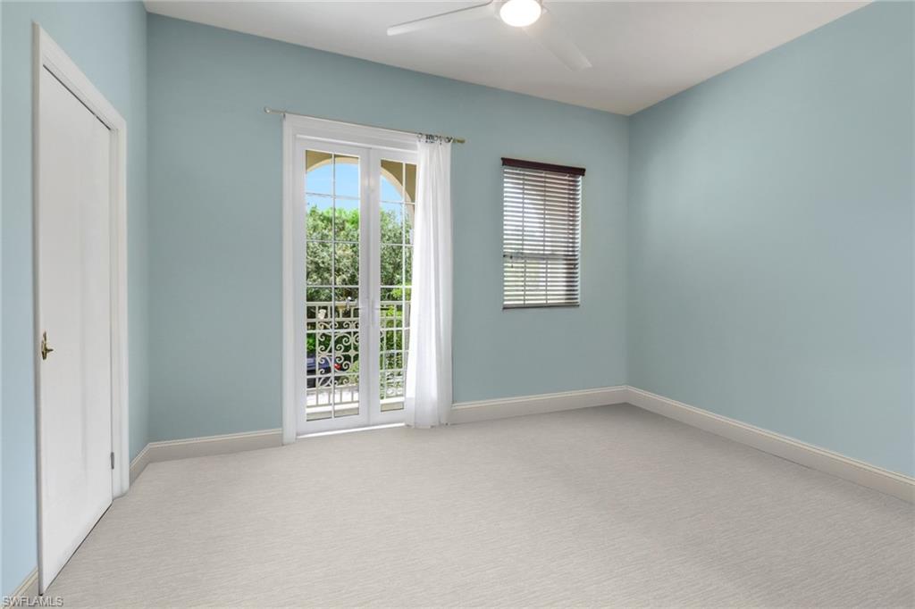 3530 Lansing Loop, Unit 204 Estero, FL 33928 - Photo 25 of 48 a view of an empty room with a window
