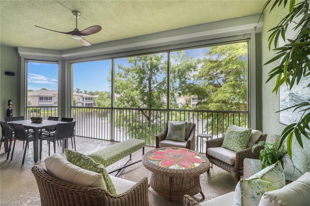 3530 Lansing Loop, Unit 204 Estero, FL 33928 - Photo 30 of 48 a living room with furniture and a window