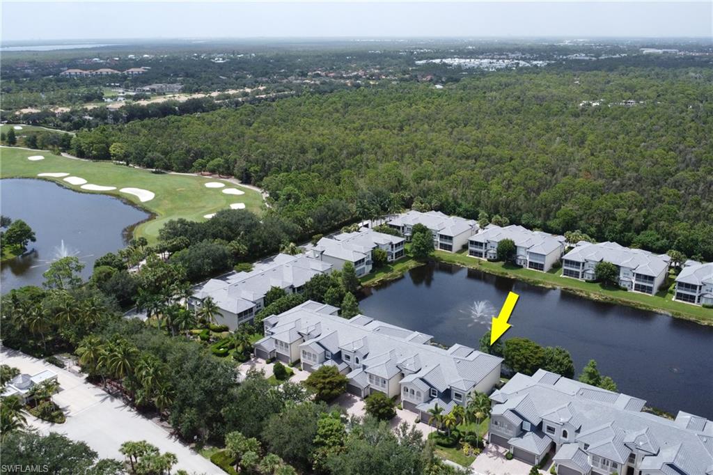 3530 Lansing Loop, Unit 204 Estero, FL 33928 - Photo 36 of 48 an aerial view of a house with a garden