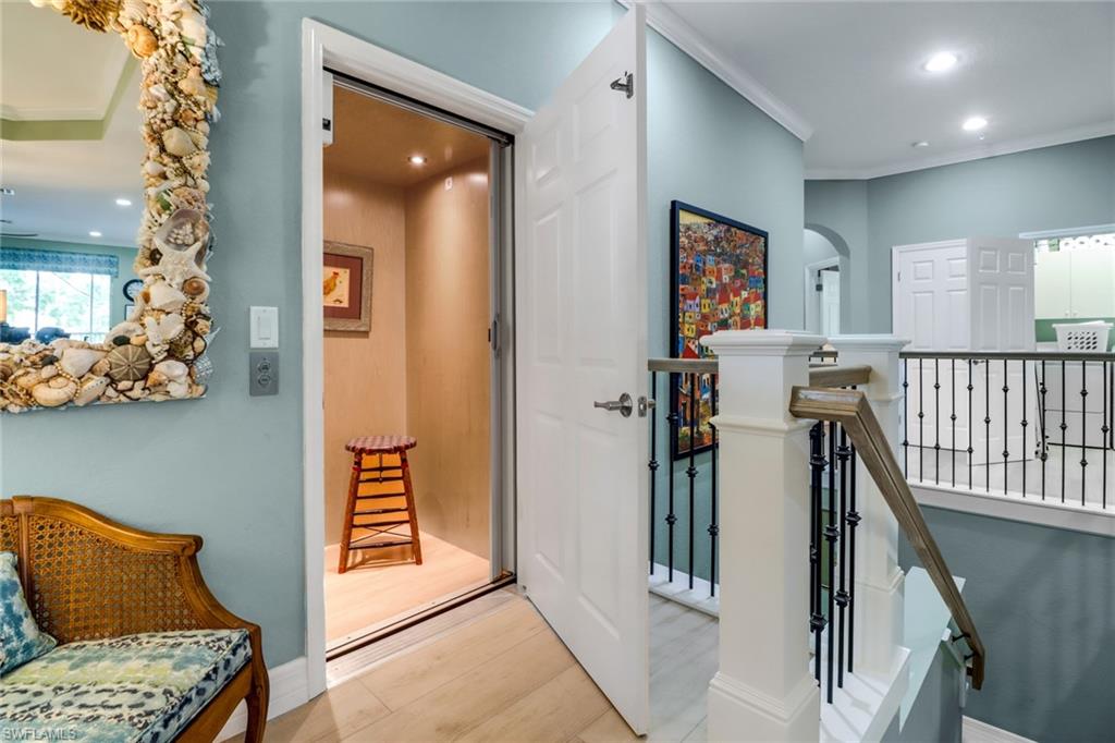 3530 Lansing Loop, Unit 204 Estero, FL 33928 - Photo 4 of 48 a view of hallway with furniture and windows