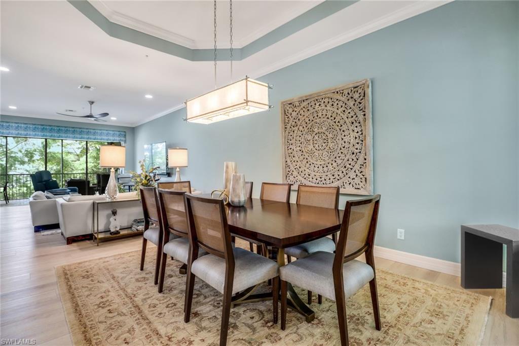 3530 Lansing Loop, Unit 204 Estero, FL 33928 - Photo 6 of 48 a view of a dining room with furniture