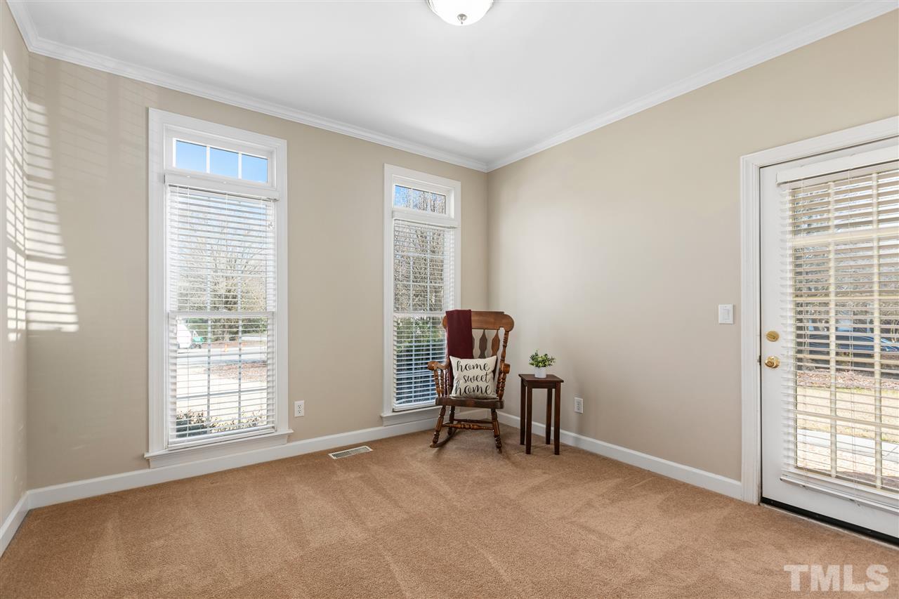 106 Ecklin Lane Cary, NC 27519 - Photo 12 of 29 a view of a room with furniture and a window