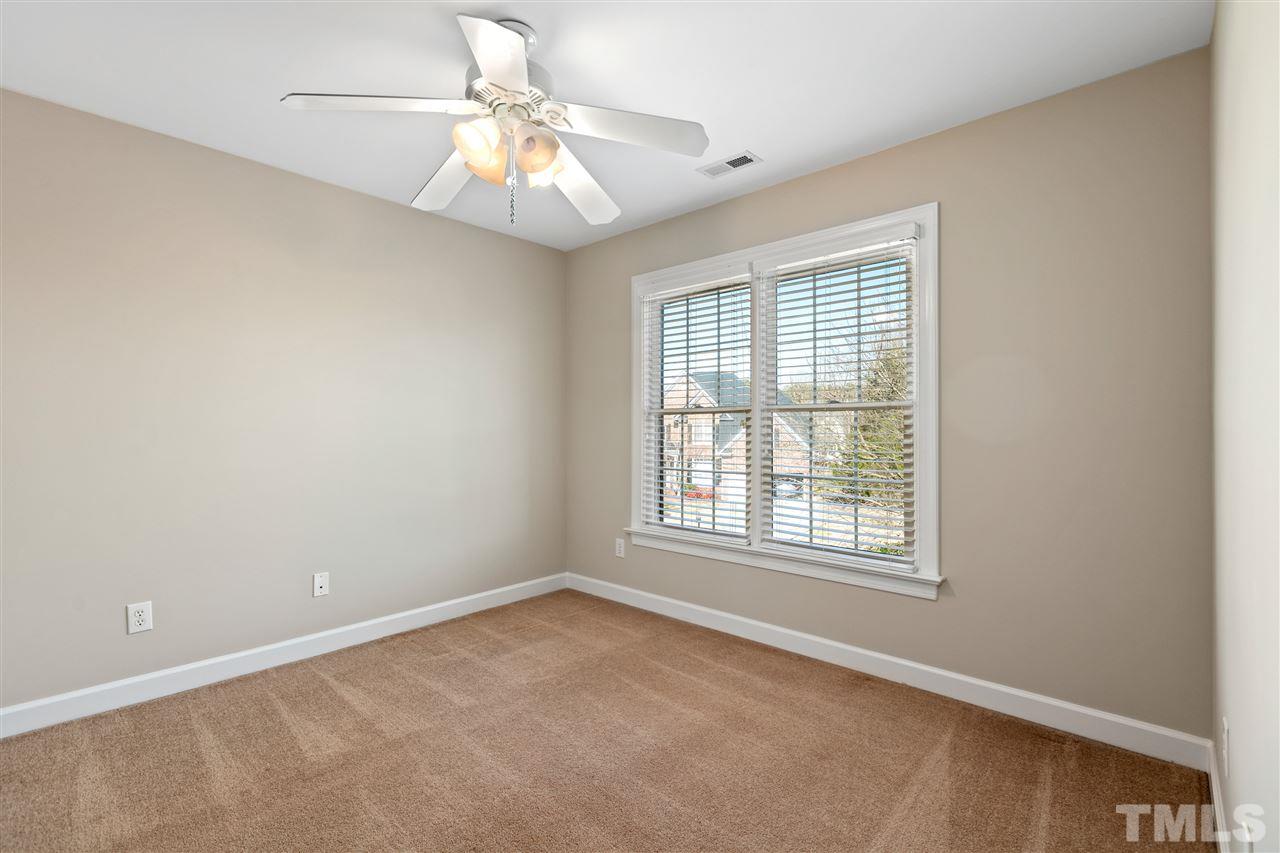 106 Ecklin Lane Cary, NC 27519 - Photo 22 of 29 an empty room with a window