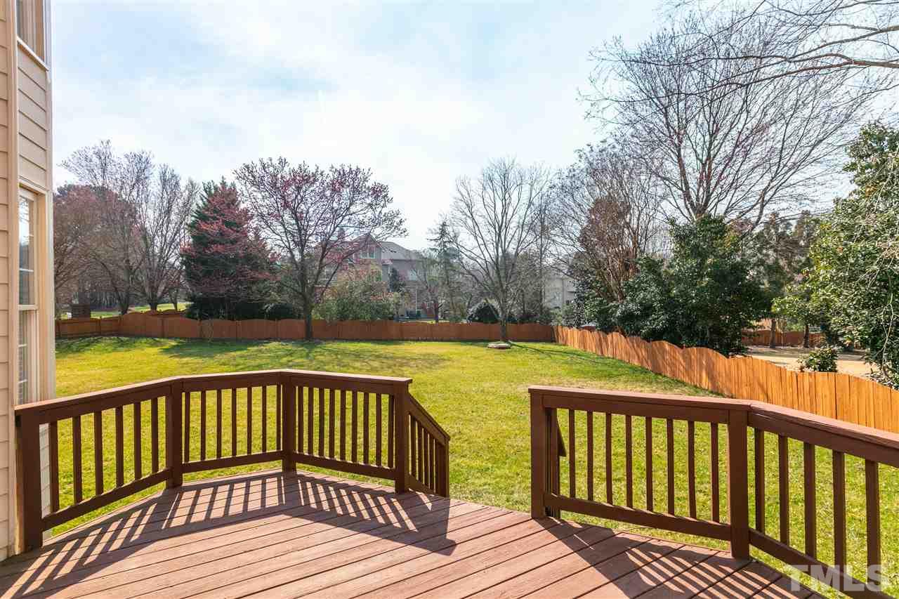 106 Ecklin Lane Cary, NC 27519 - Photo 24 of 29 a view of a wooden deck with large trees